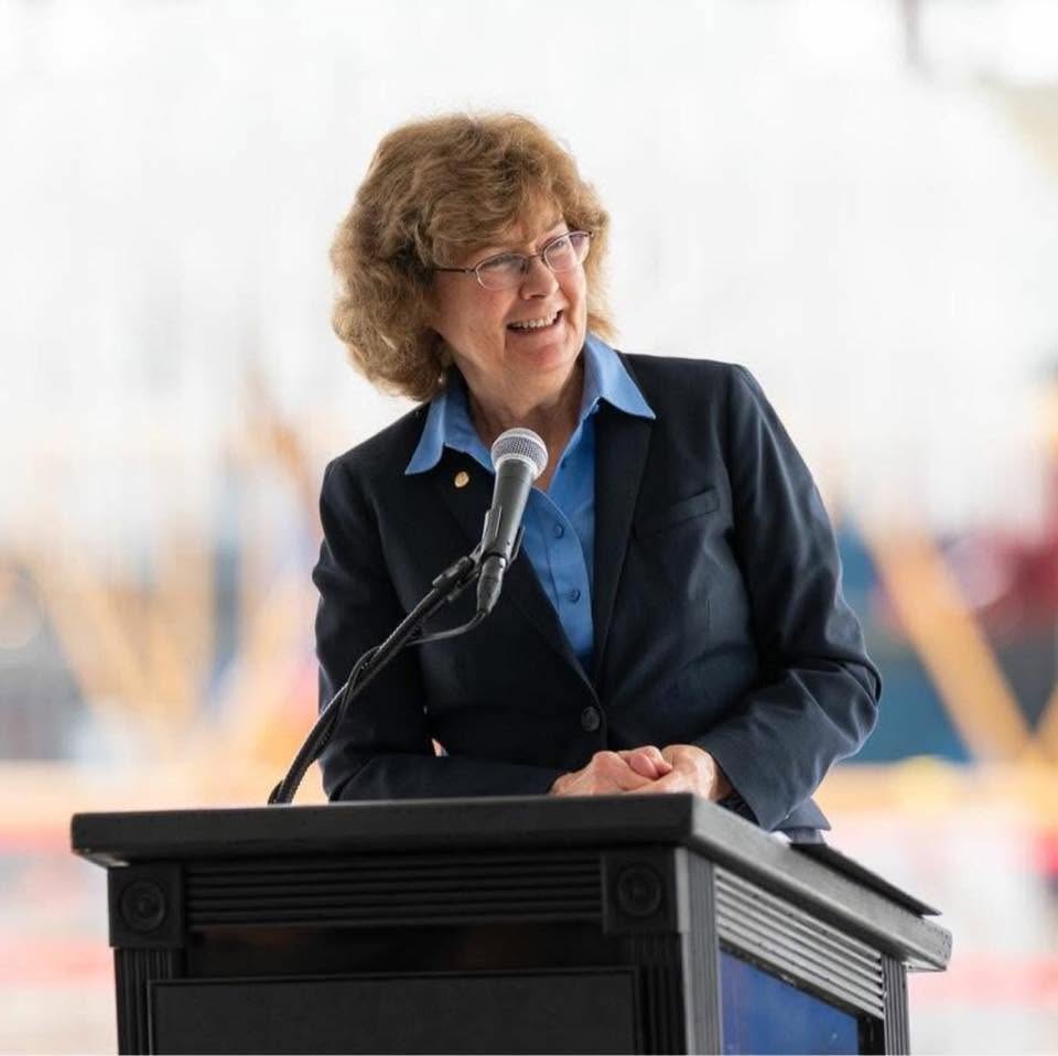 Mayor Carol McCutcheon speaking at a podium